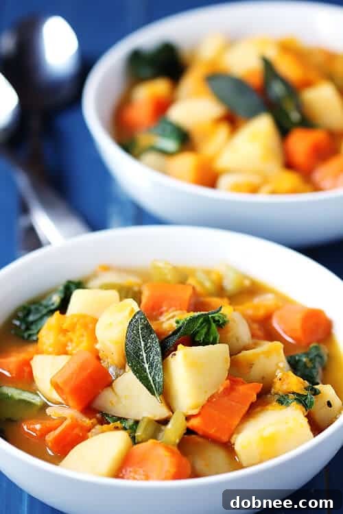 A large pot of Slow Cooker Root Vegetable Stew, ready to be served, showcasing its comforting and wholesome nature.