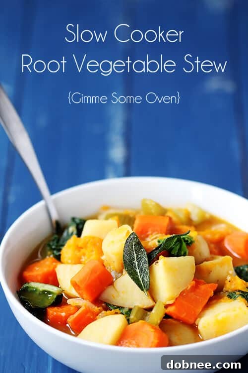Two bowls of Slow Cooker Root Vegetable Stew, garnished with fresh sage, on a rustic table setting, inviting comfort.