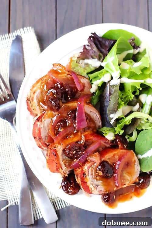 Maple Bacon-Wrapped Pork Tenderloin with Rosemary Cherry Sauce