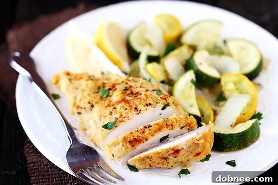 Hummus-crusted chicken with a golden crust and roasted vegetables