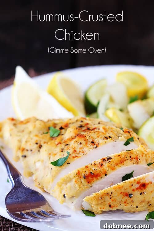 Easy Hummus-Crusted Chicken | gimmesomeoven.com Detailed view of the appetizing hummus crust on baked chicken, highlighting its texture and golden-brown perfection