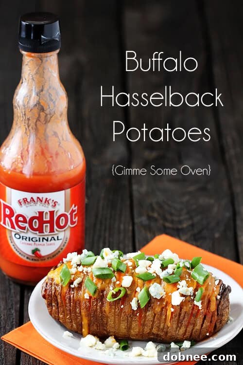 Close-up of baked Buffalo Hasselback Potatoes, showing the fanned-out slices and melted cheese.