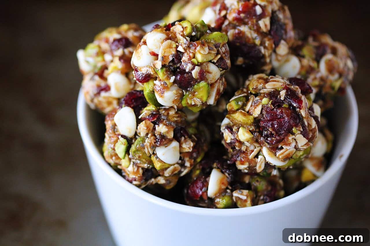 Cranberry Pistachio Energy Bites - A delightful and healthy snack, perfect for a quick energy boost. These colorful bites are ideal for post-holiday snacking or everyday wellness.