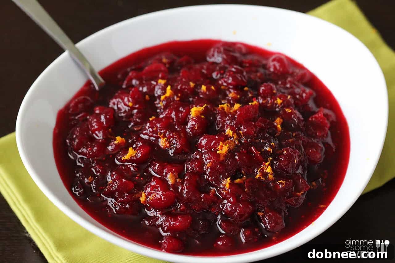 Orange Bourbon Cranberry Sauce, garnished with fresh orange zest.