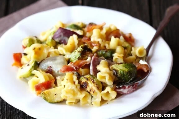 Delicious Roasted Brussels Sprouts, Bacon & Pepperjack Macaroni & Cheese recipe from Gimme Some Oven.