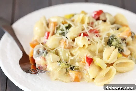 Hearty and comforting Roasted Vegetable Macaroni & Cheese, packed with flavor.