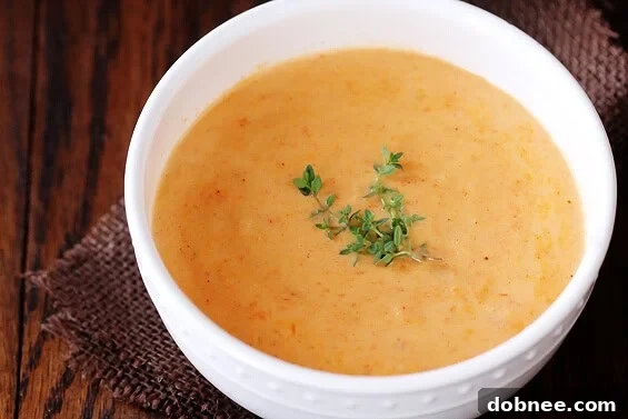 Rich and creamy homemade Lobster Bisque, a luxurious restaurant-style soup.