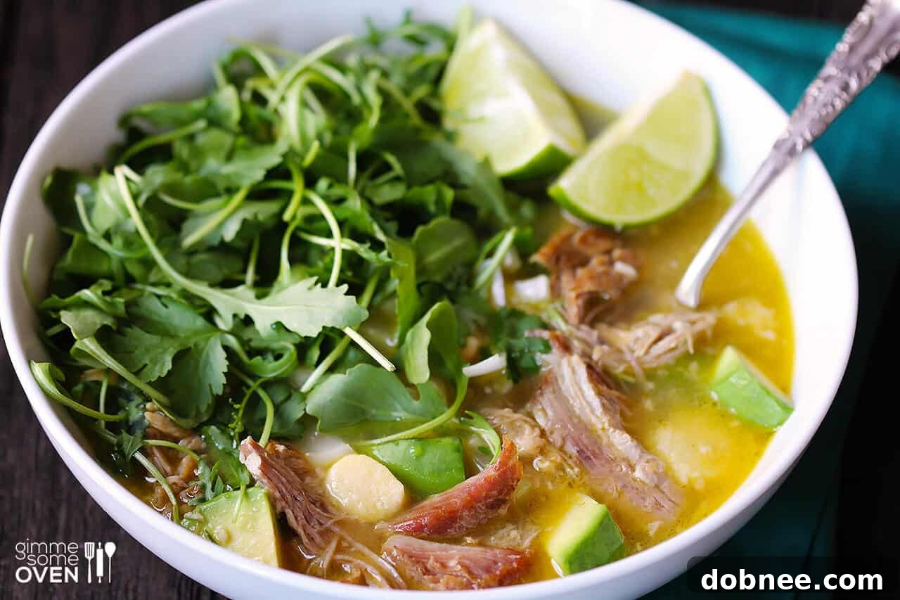 Hearty and savory Carnitas Caldo, a Mexican-inspired pork soup.