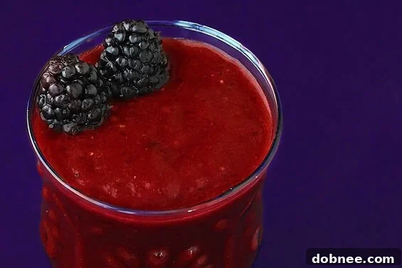 Purple Smoothie Recipe | gimmesomeoven.com Berry-Packed Purple Smoothie with Berries, Pomegranate, and Banana
