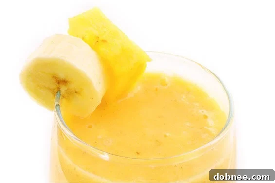 Pineapple Orange Banana Smoothie | gimmesomeoven.com Classic Pineapple Orange Banana Smoothie for a Tropical Twist
