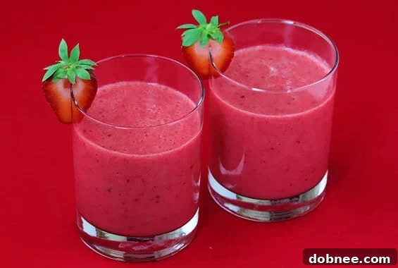 Red Smoothie Recipe | gimmesomeoven.com Antioxidant-Rich Red Smoothie with Strawberries, Mango, and Cranberries