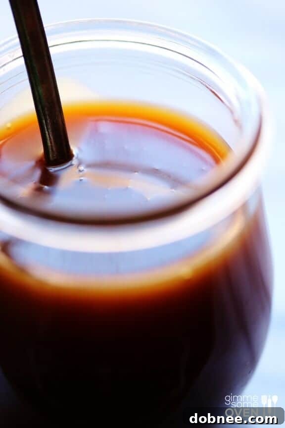 Caramel sauce drizzled over apples and nuts, a perfect snack