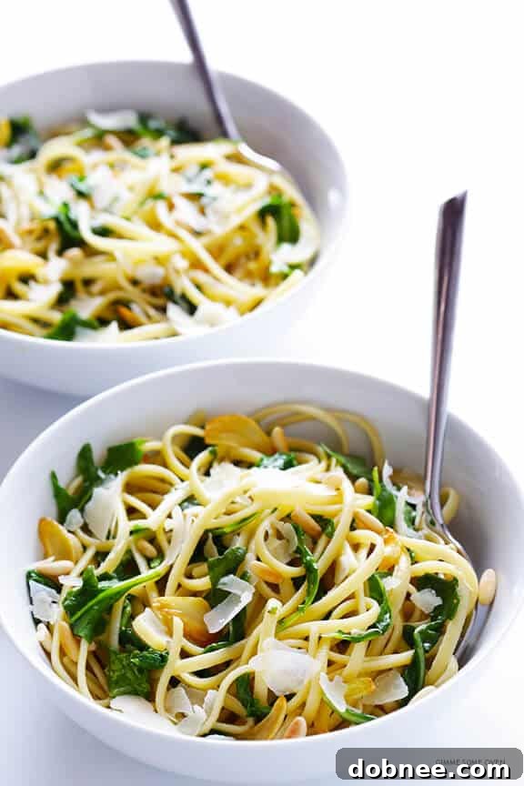 Overhead view of a prepared bowl of Linguine with Arugula, Garlic, and Parmesan