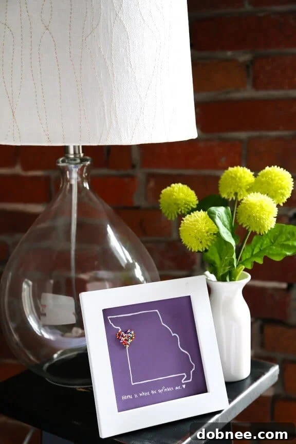 DIY Sprinkles Art featuring a city outline made with colorful nonpareils.