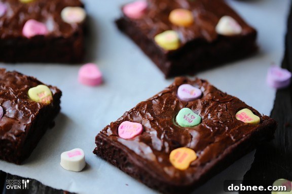 Colorful Conversation Heart Brownies with chocolate fudge topping