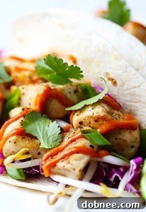 Thai Chicken Tacos with peanut sauce and fresh cilantro