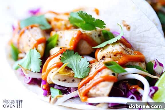 Ingredients for Thai Chicken Tacos laid out on a cutting board, ready for prep