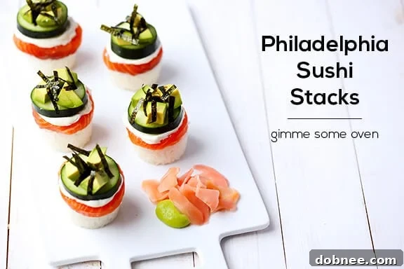 A plate of two Philadelphia Sushi Stacks, garnished beautifully