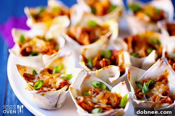 Delicious and easy chicken enchilada cups made with crispy wonton wrappers