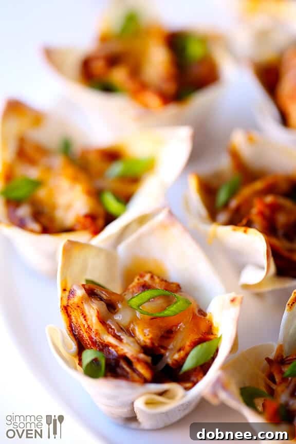 Assorted chicken enchilada cups with various garnishes