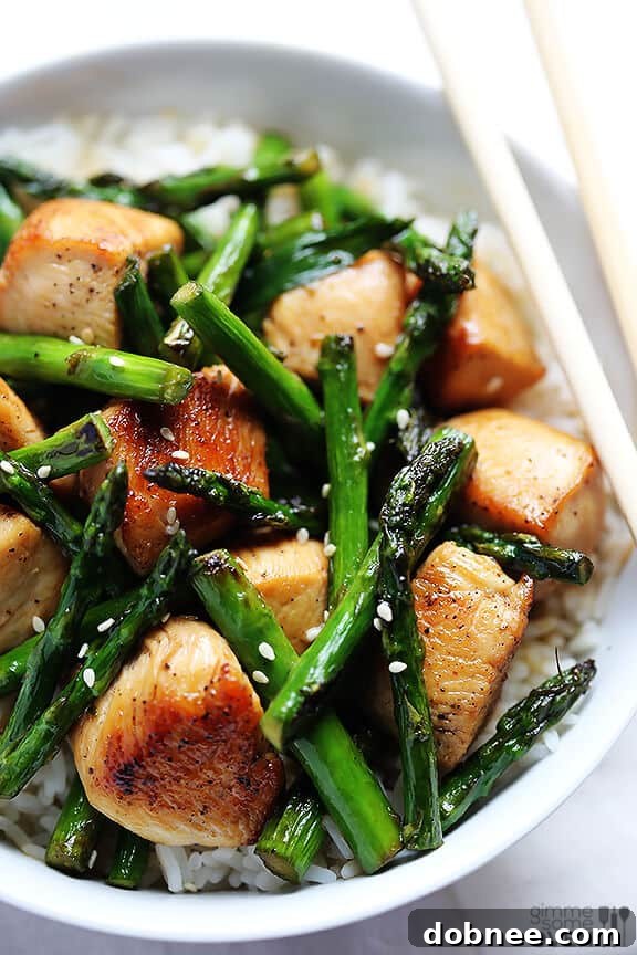 Closeup of Chicken and Asparagus Stir-Fry in a pan