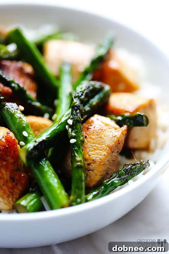 Chicken and Asparagus Stir-Fry in a white bowl