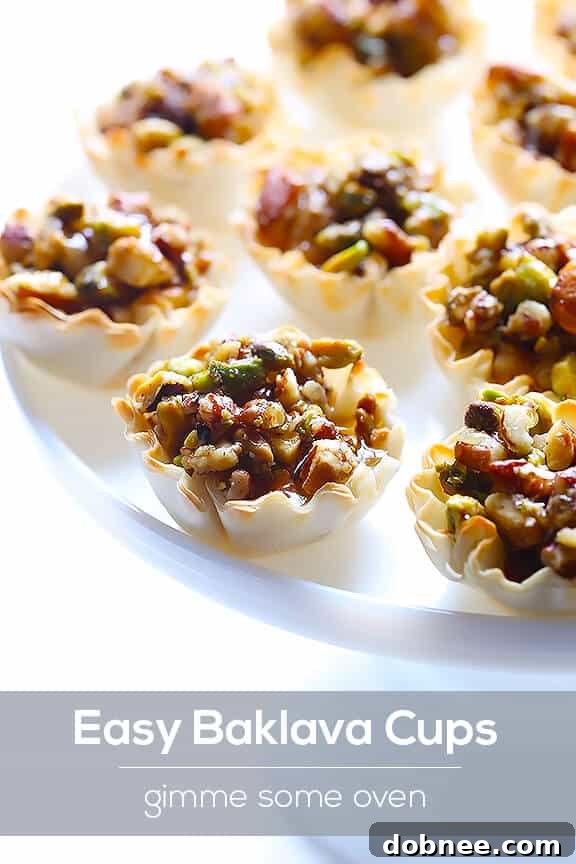 Beautifully arranged Baklava Cups on a plate, gleaming with honey