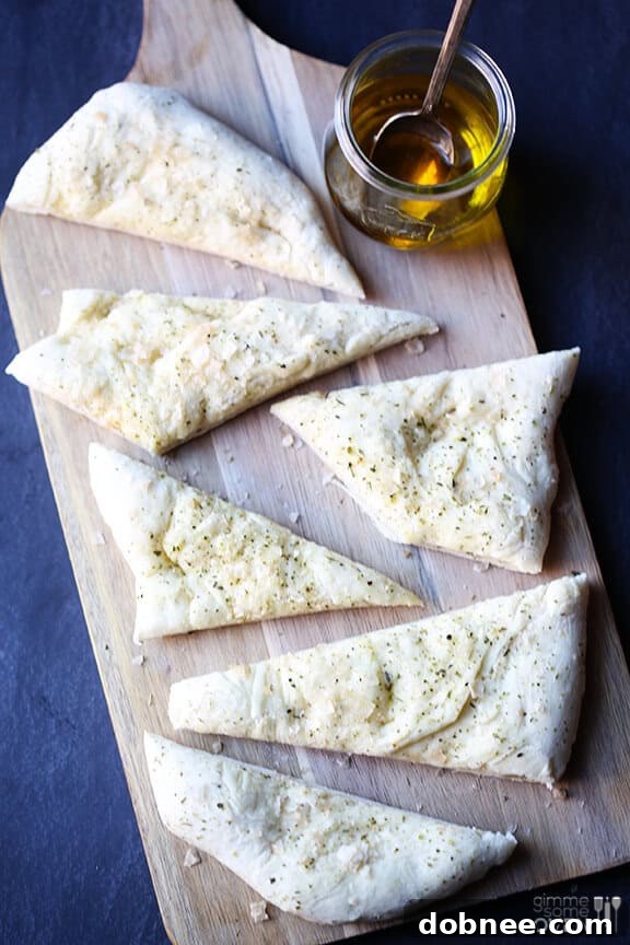 Crispy Italian Flatbread on a wooden cutting board