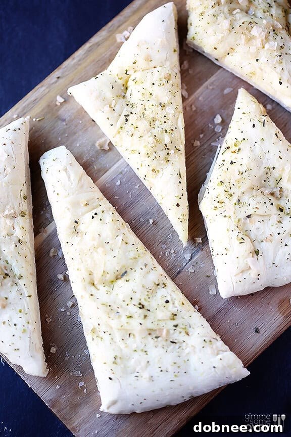Close-up of baked Italian Flatbread, sprinkled with herbs and salt