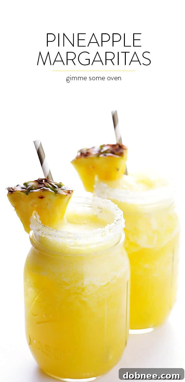 Tropical Pineapple Margaritas 8 Table spread with Fresh Pineapple Margaritas and garnishes