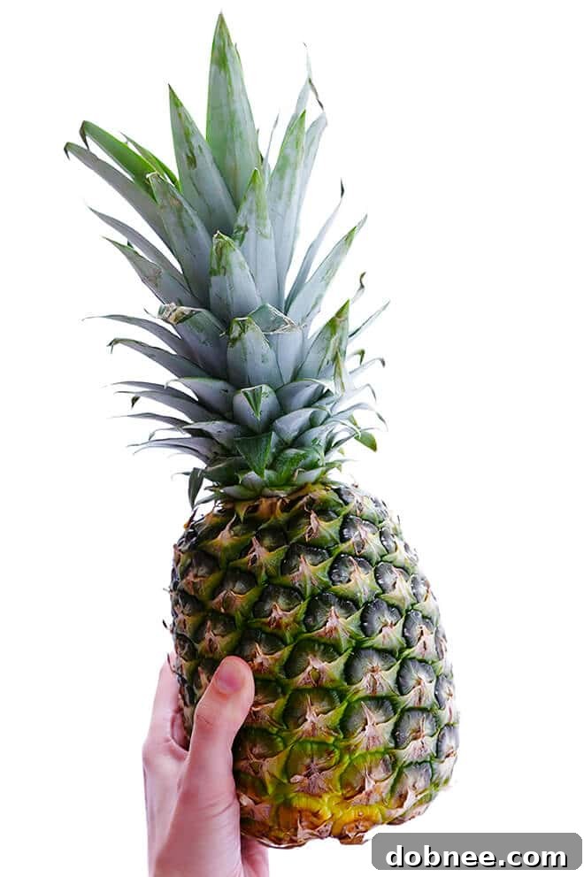 Learn how to cut a pineapple with this step-by-step video, plus tips on how to select, store, and cook with fresh pineapple!