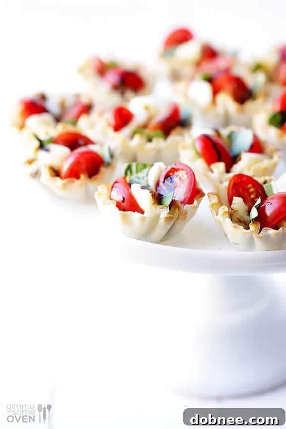 Finished Caprese Phyllo Cups arranged on a serving platter