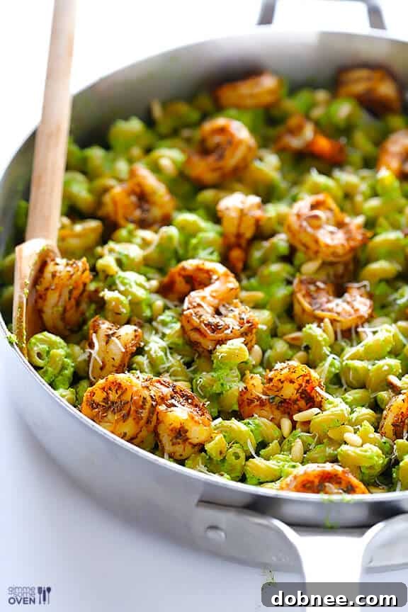 Serving Asparagus Pesto Shrimp Pasta Close-up of a serving of Asparagus-Spinach Pesto Pasta with Blackened Shrimp.