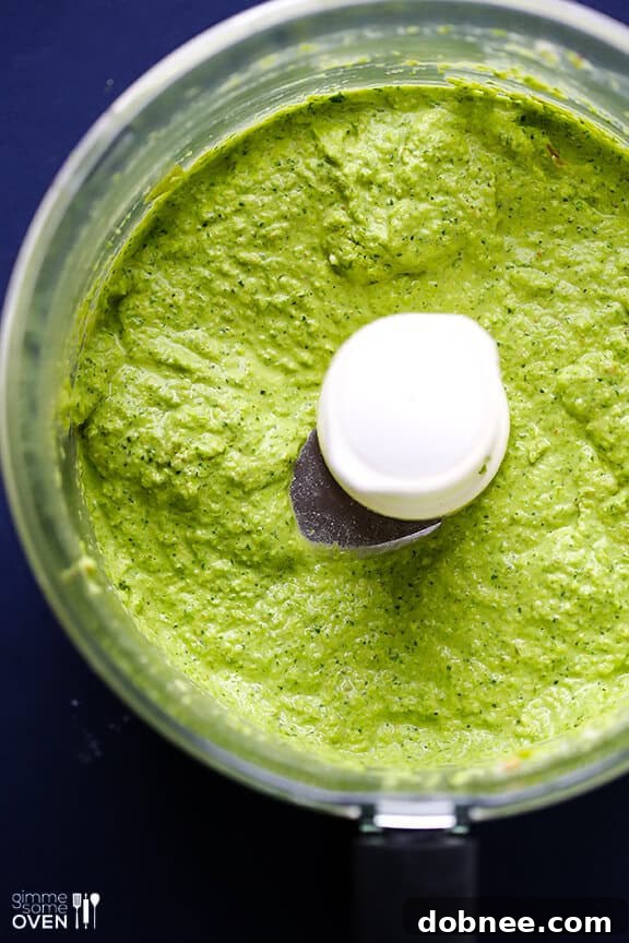 Freshly Made Asparagus-Spinach Pesto Rich green asparagus spinach pesto ready to be added to pasta.