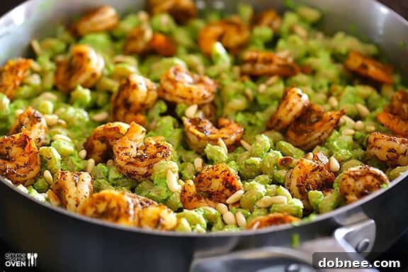 Pasta with Pesto and Pine Nuts Tossing pasta with asparagus-spinach pesto and toasted pine nuts.