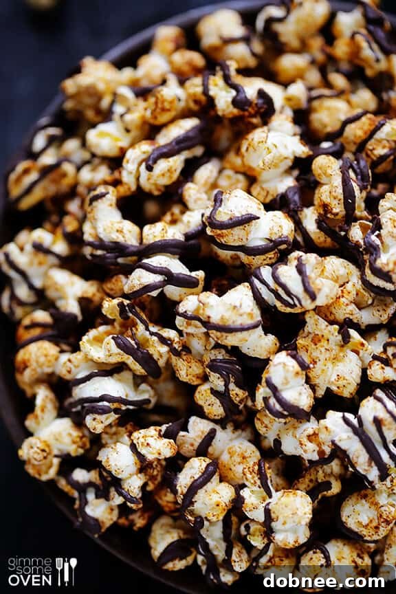 Close-up of Spiced Chocolate Popcorn drizzled with dark chocolate