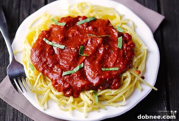 Pasta with Dark Chocolate Marinara Sauce - A unique and flavorful twist on traditional marinara, perfect for gourmet pasta lovers.