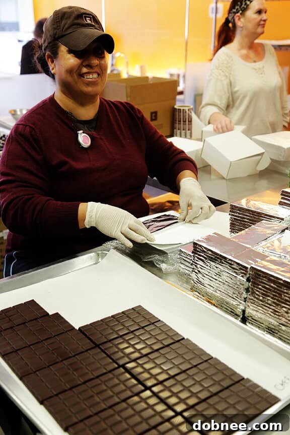 Smiling Team Member at Christopher Elbow Chocolates