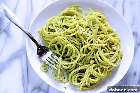 Delicious Arugula Pesto Pasta served fresh on a plate