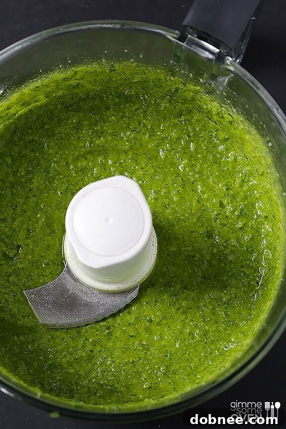 Fresh Arugula Pesto Pasta in a bowl, ready to serve