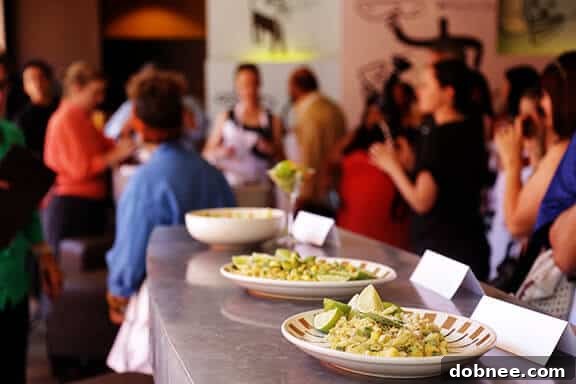 Bloggers showcasing their creative avocado pasta dishes for judging