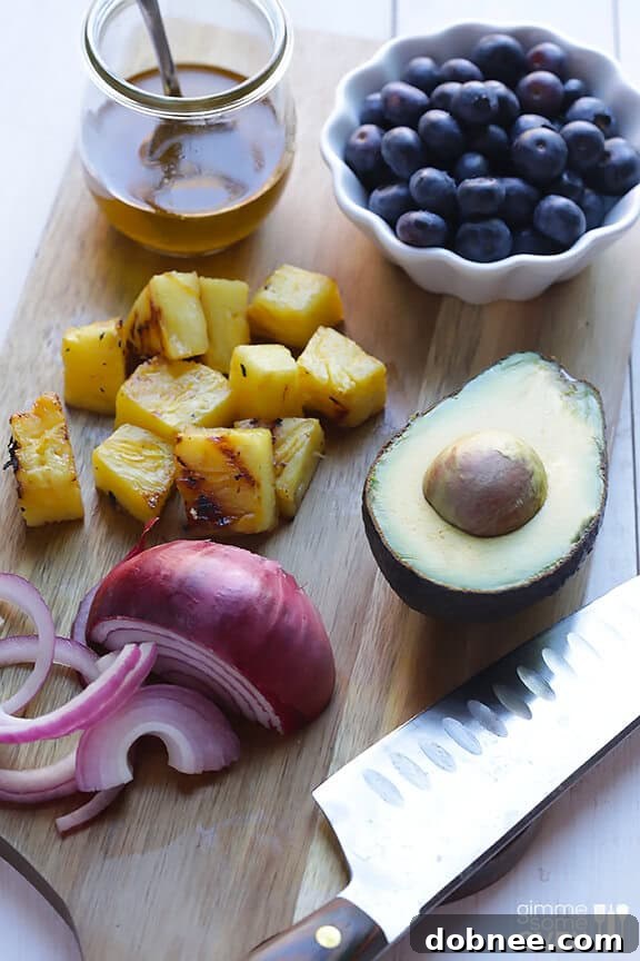 Close-up of fresh grilled pineapple and chicken for the salad