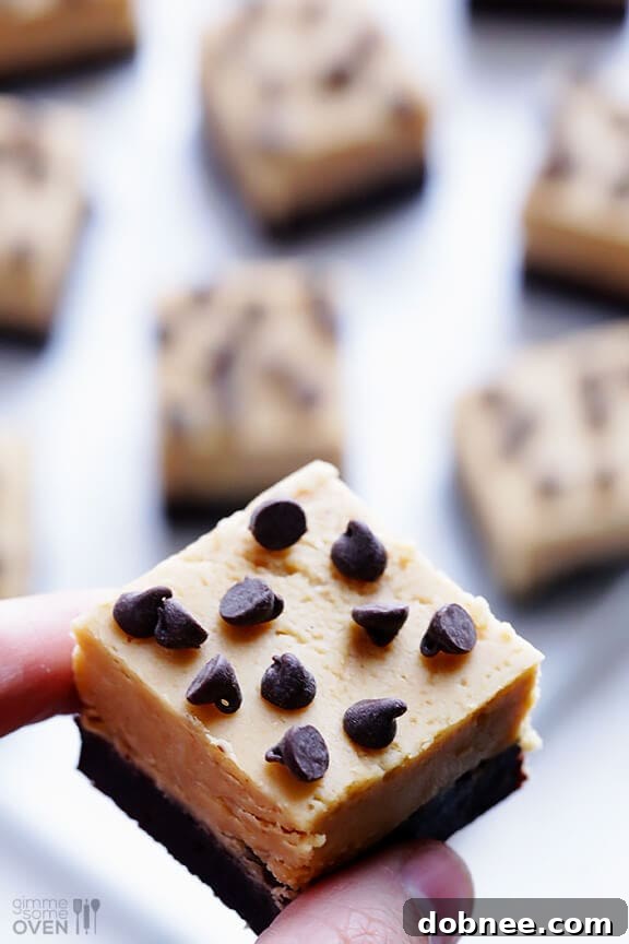 A single Peanut Butter Fudge Brownie with a bite taken out, revealing layers