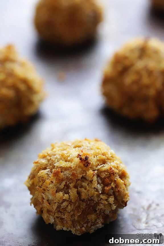 Stack of Oven-Fried Spanish Croquettes with a dipping sauce