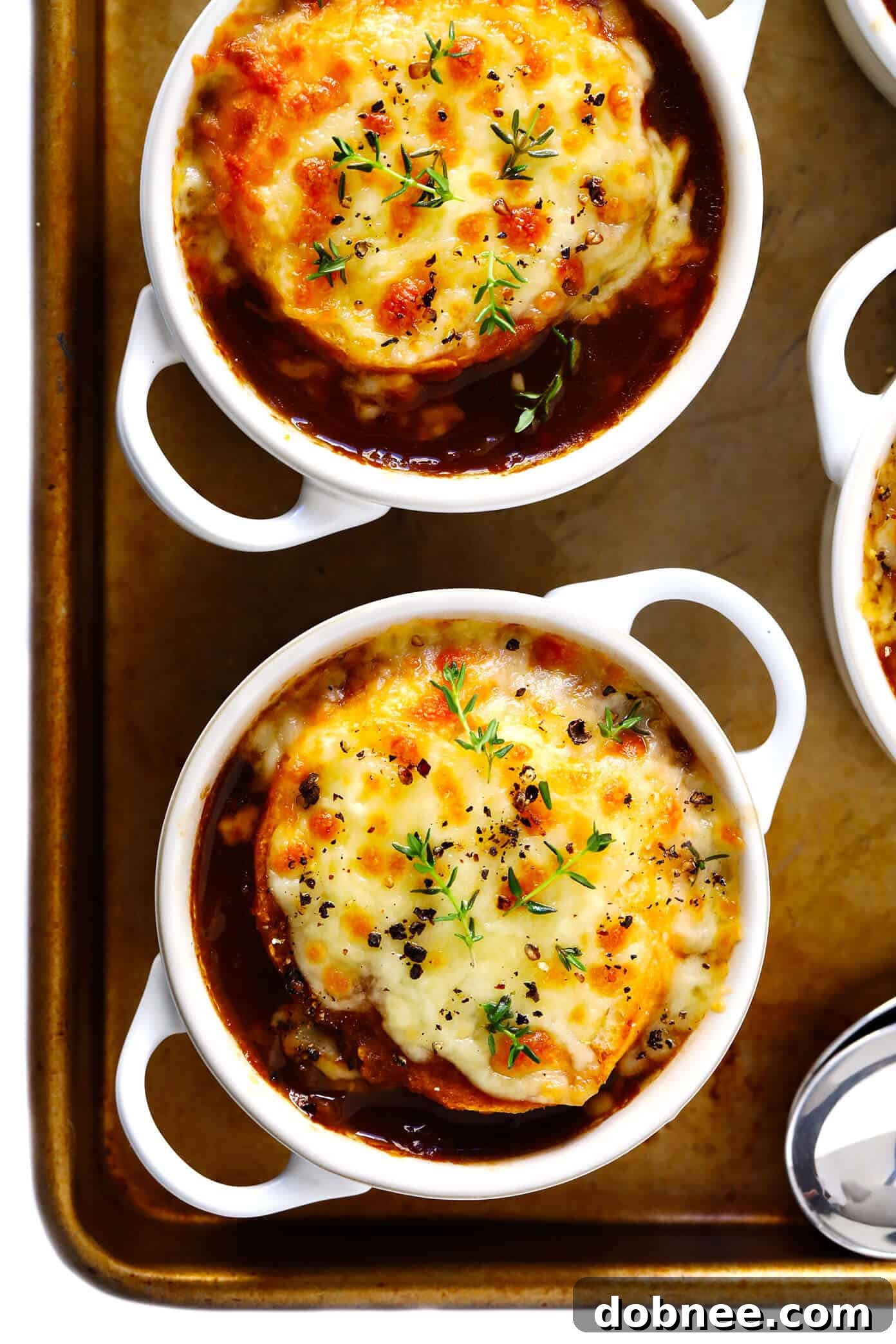 Classic French Onion Soup with perfectly caramelized onions and cheesy baguette