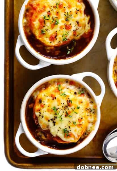 French Onion Soup Recipe, garnished with fresh thyme