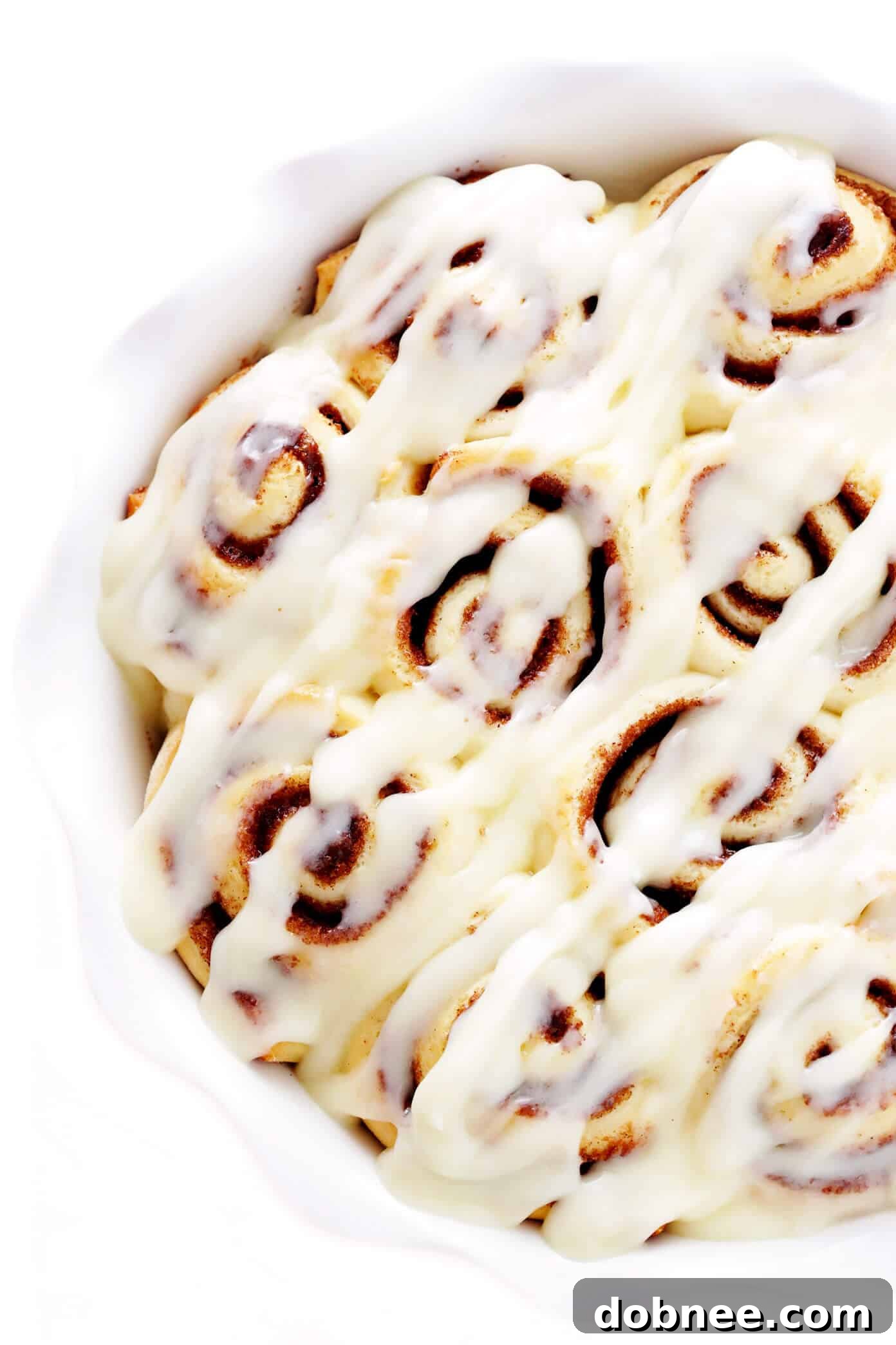 A warm pan of freshly baked 1-Hour Cinnamon Rolls, ready to be enjoyed