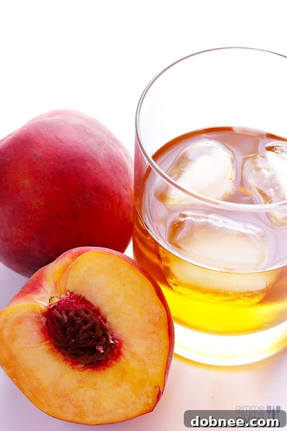 Close-up of a slice of Peach Bourbon Pie showcasing the rich filling