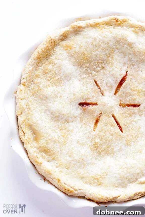 Overhead view of Peach Bourbon Pie slices on a serving dish