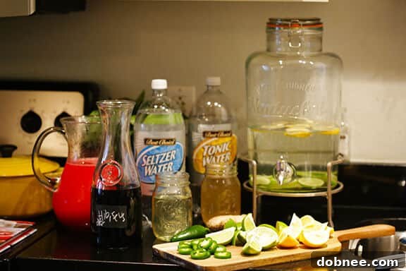 Mocktail mixers laid out on a table, including Agua de Jamaica.